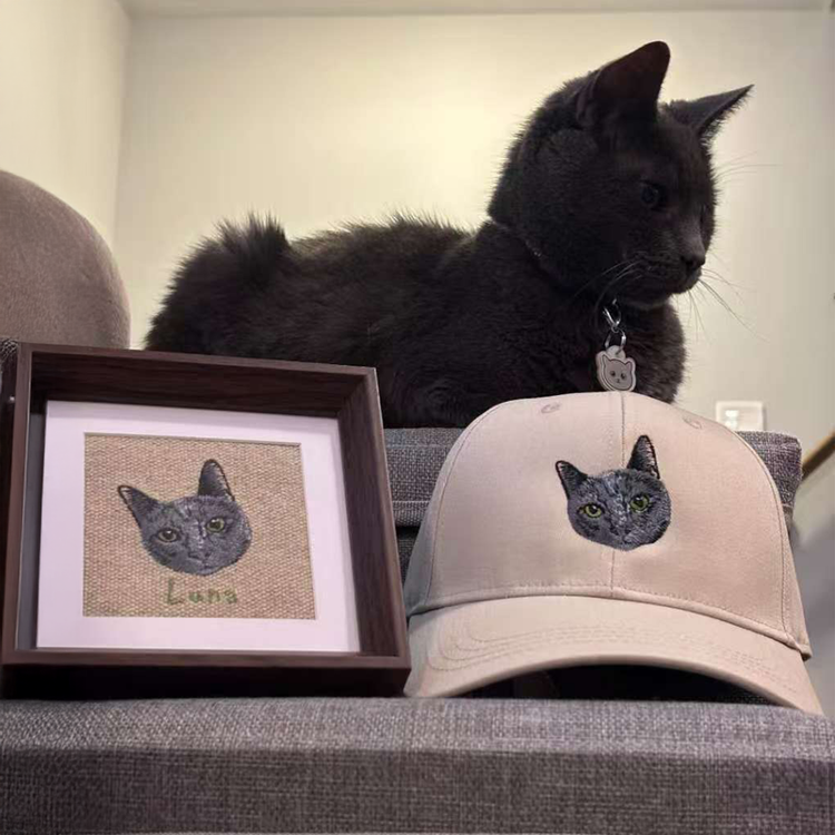 Black cat posing with custom embroidered portrait hat and framed art - customer review 