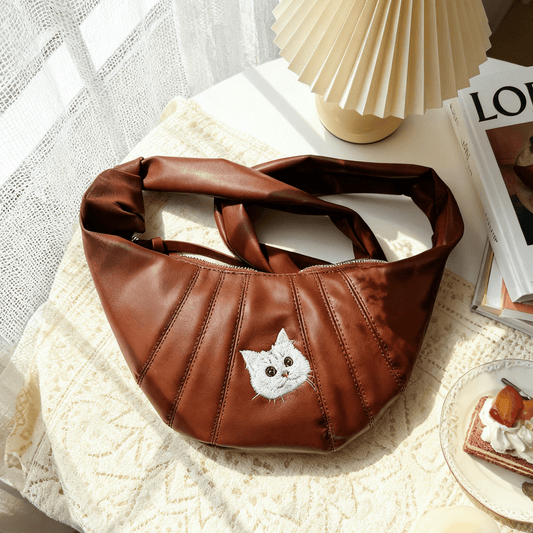 custom cat embroidered croissant bag in brown with hand-drawn portrait