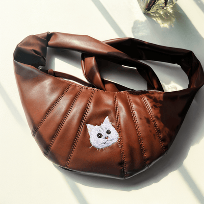 custom cat embroidered croissant bag in brown with hand-drawn portrait